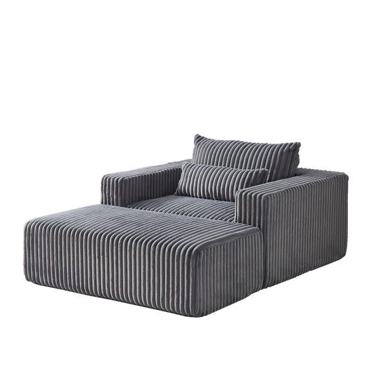 Cozy grey corduroy modular sofa with plush cushions and matching ottoman