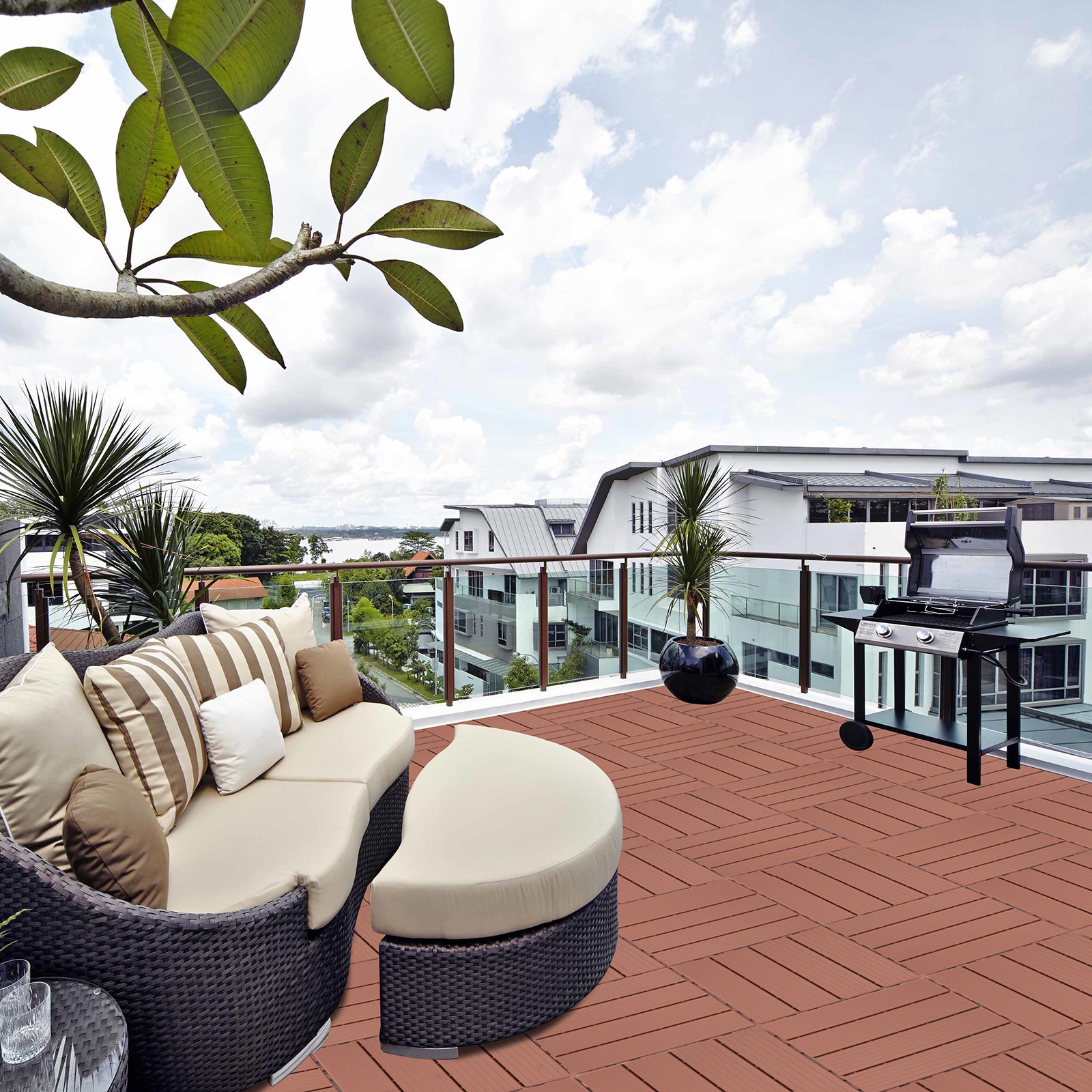 Brown wicker sectional patio sofa with striped and solid cushions for outdoor lounging