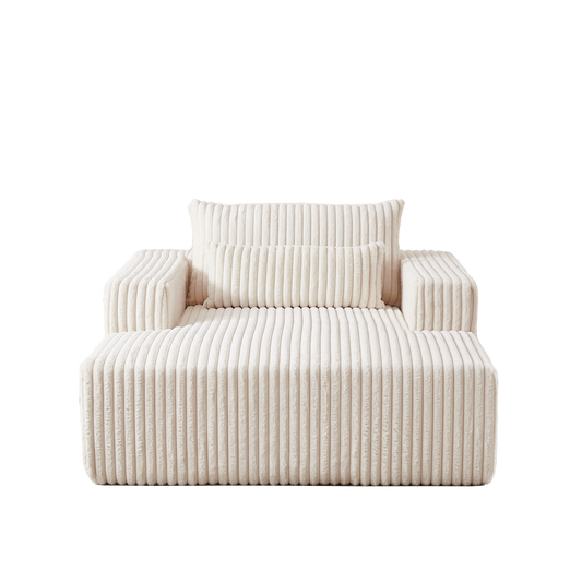 Cream corduroy modular sofa with plush channel tufting and matching ottoman