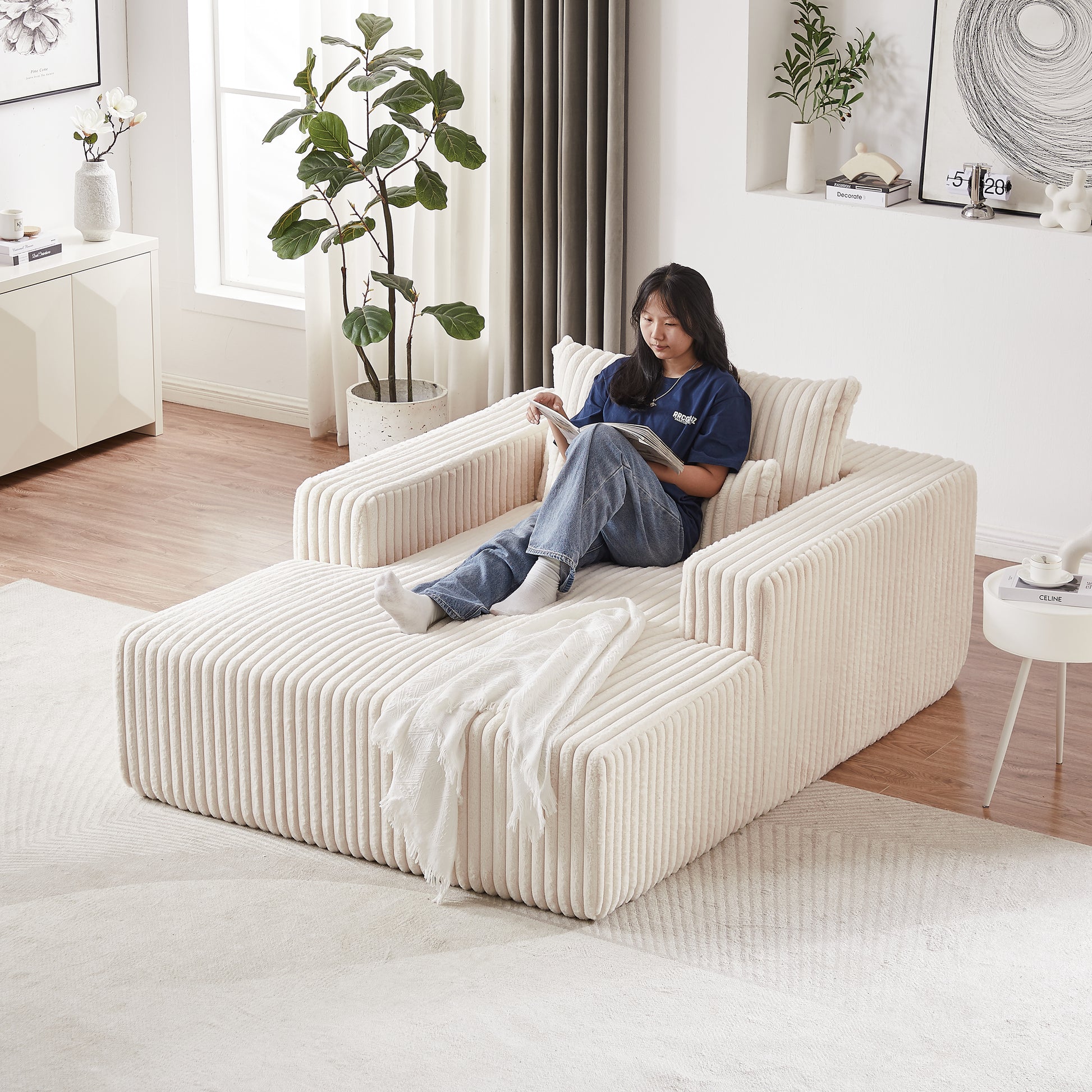 Cream corduroy sectional sofa with a chaise lounge perfect for modern living rooms