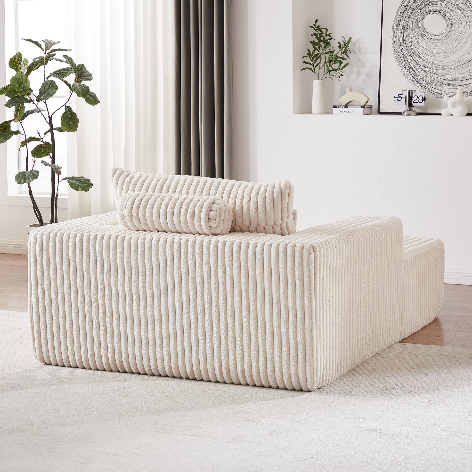 Beige corduroy modular sofa with plush pillows for modern living rooms