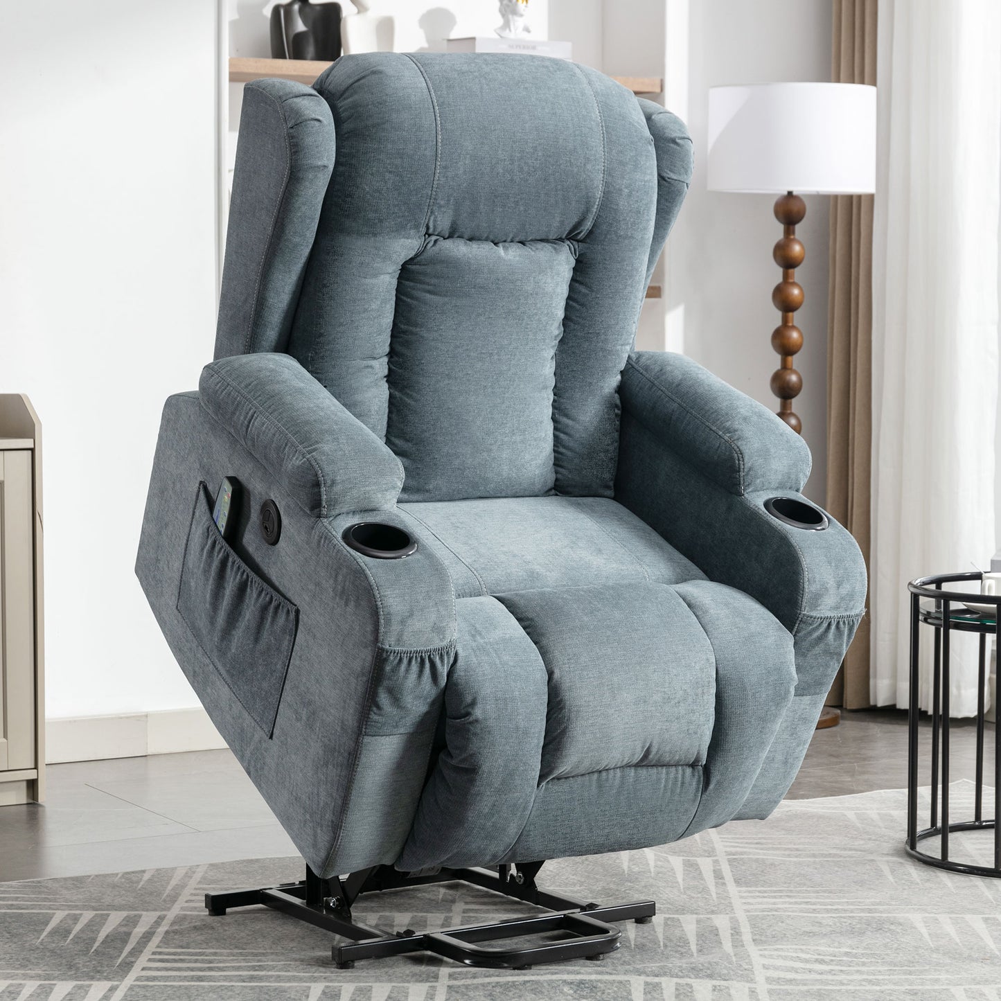 Comfortable grey fabric power lift recliner with cup holders and side pocket