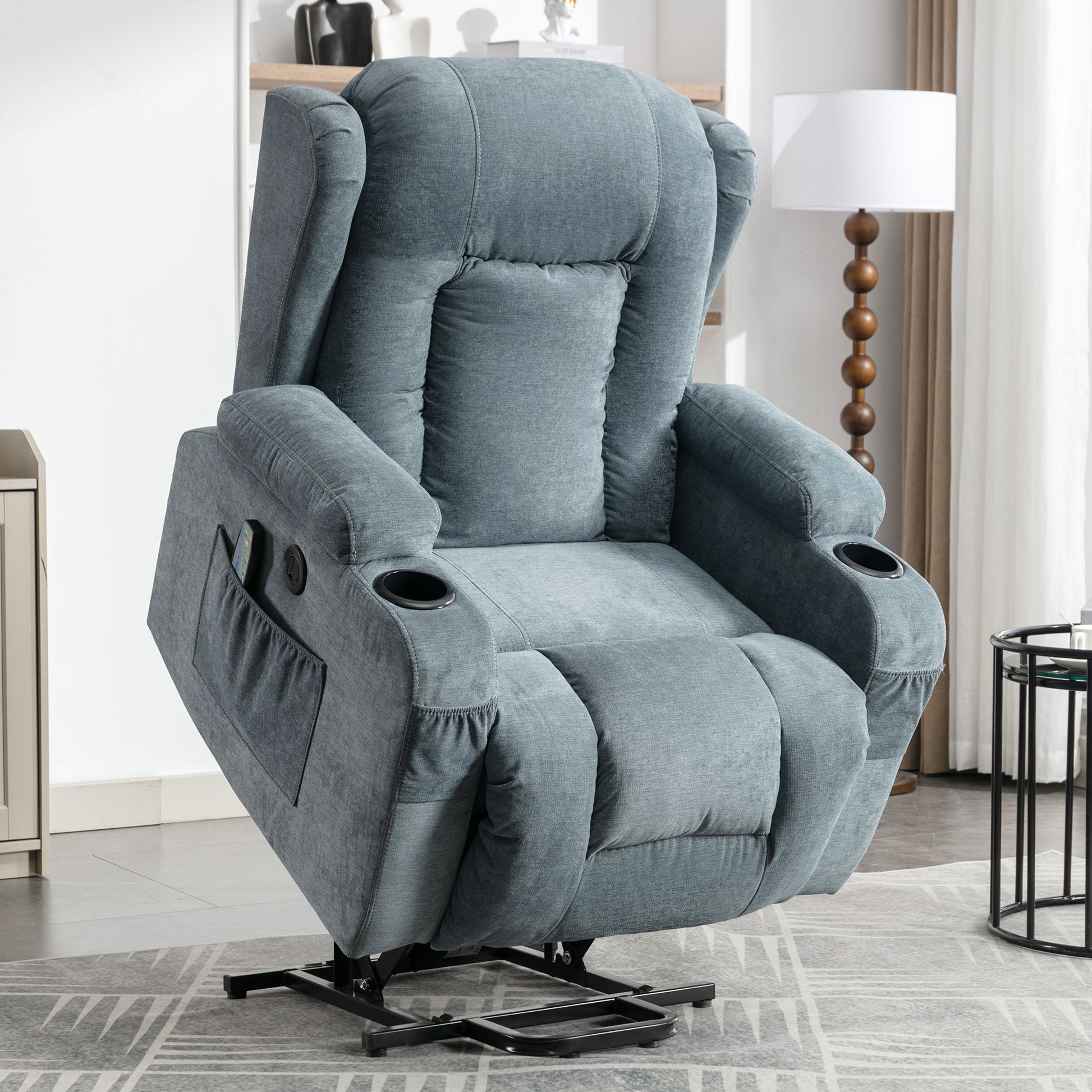 Comfortable grey fabric power lift recliner with cup holders and side pocket