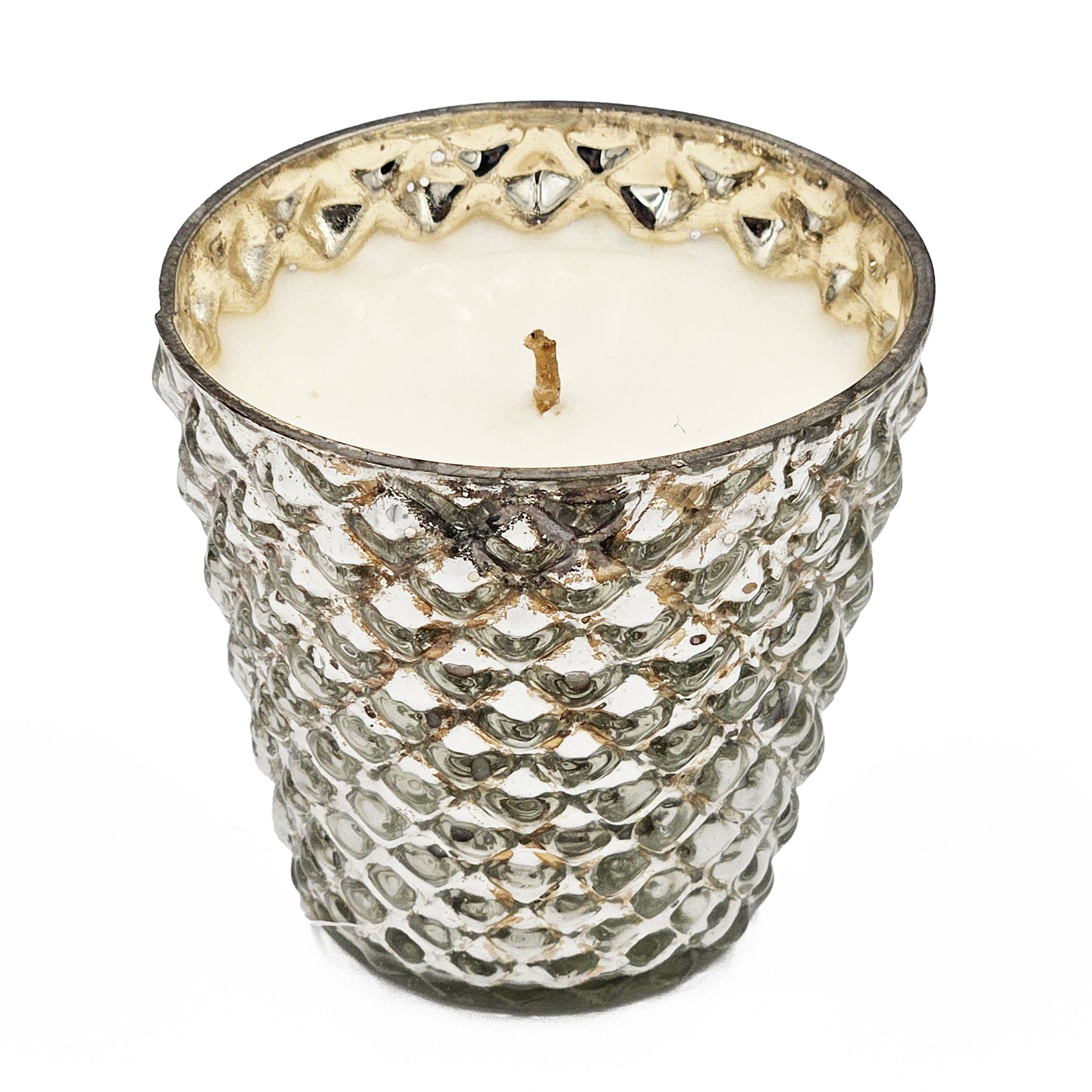 Textured mercury glass scented candle with a rustic charm and warm ambient glow