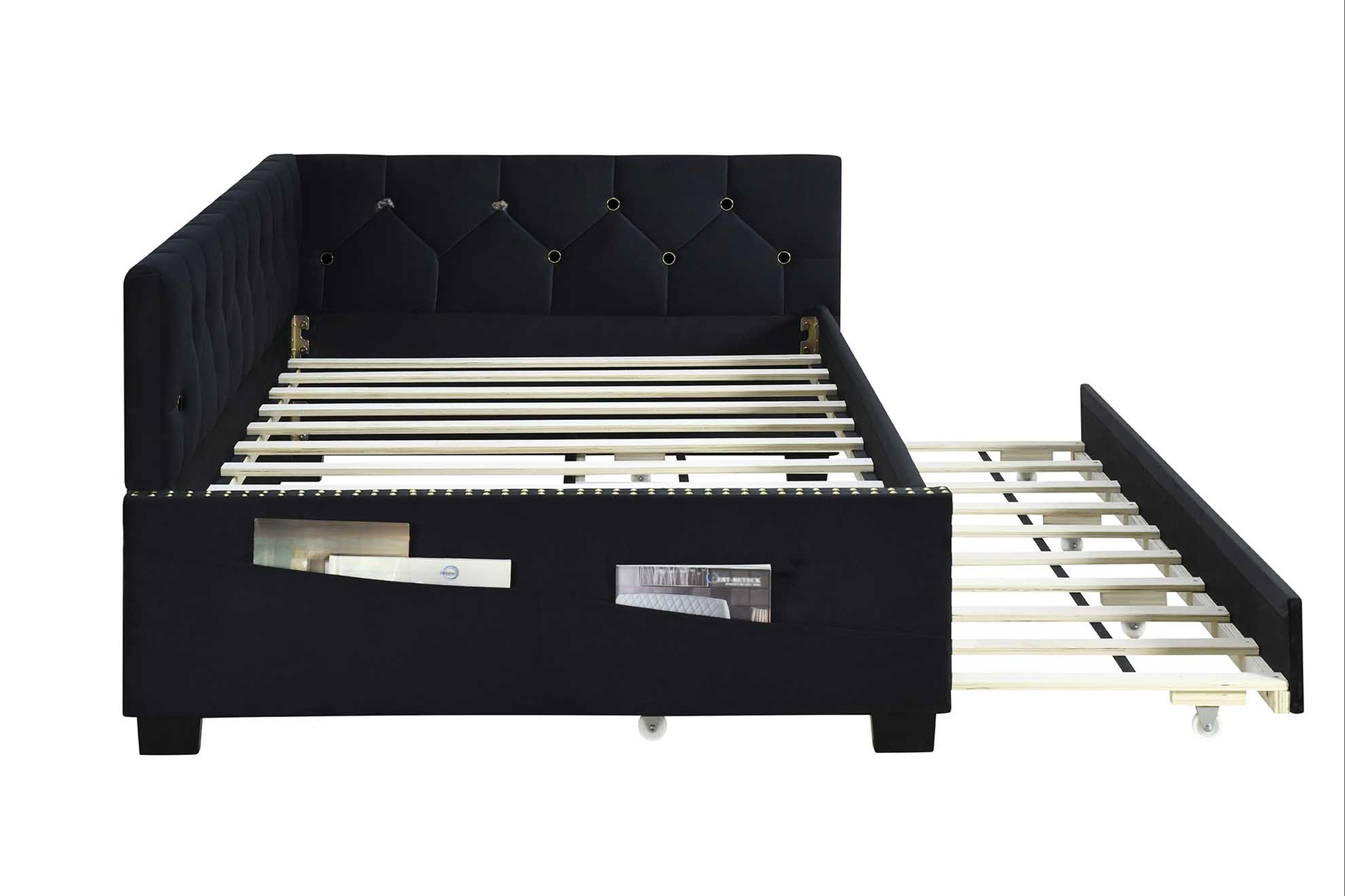 Black velvet tufted daybed with pullout trundle and storage pockets