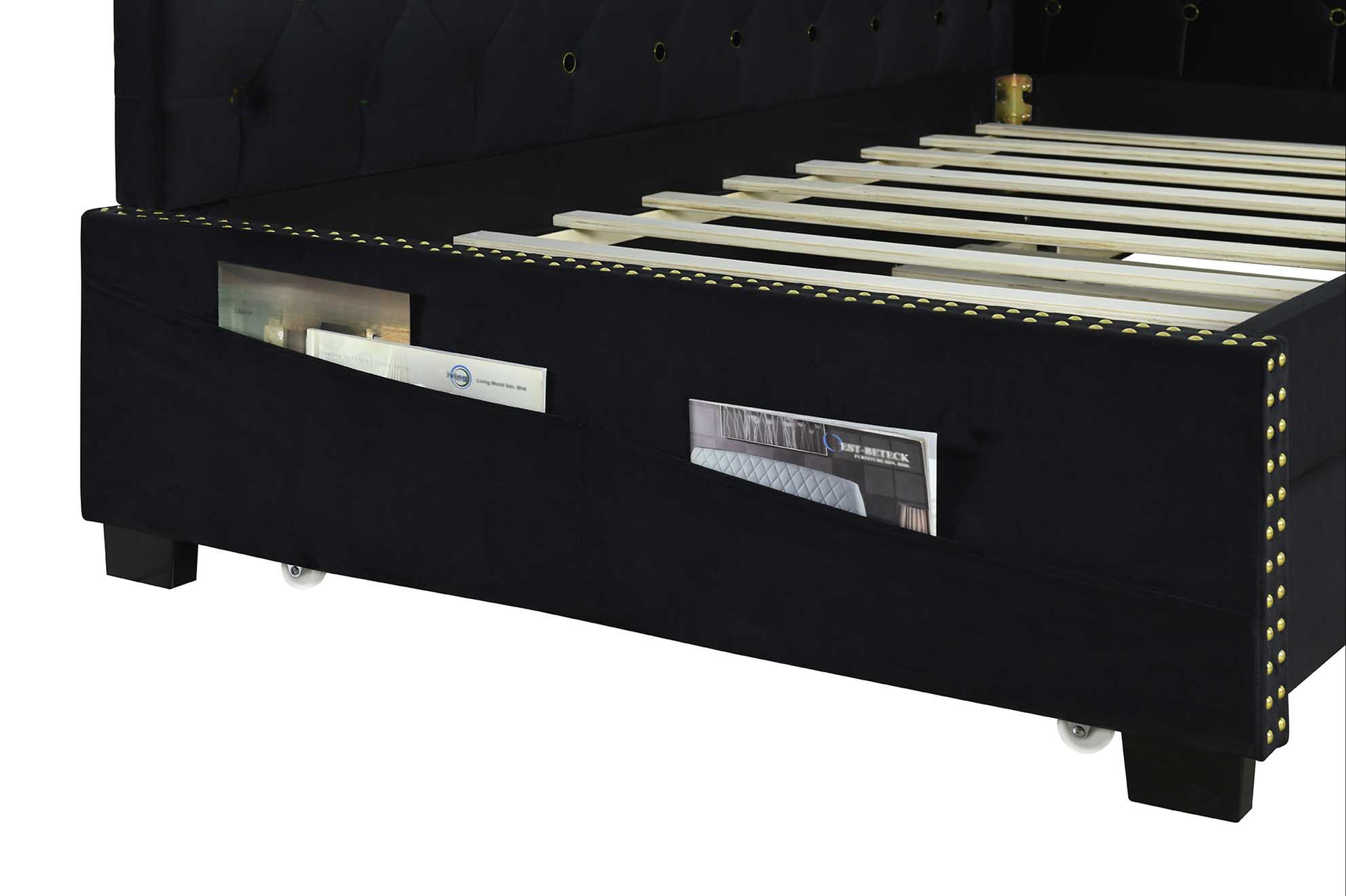 Black velvet bed frame with studded details and storage pockets