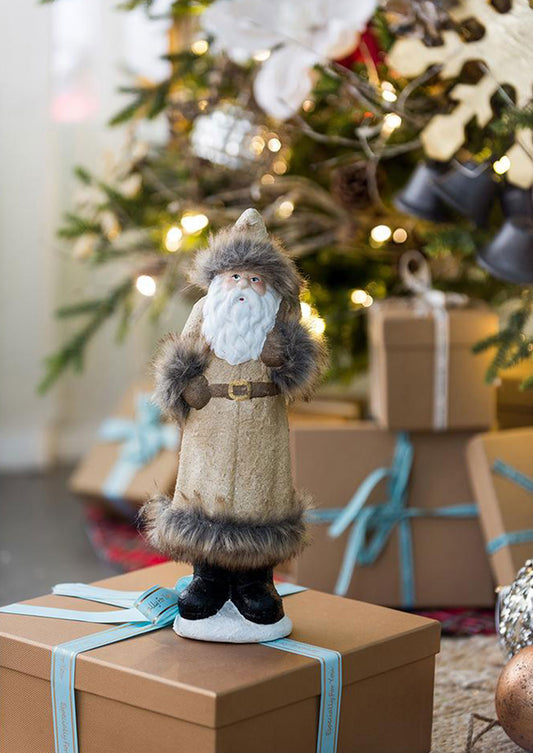 Rustic Santa Claus figurine with fur trim and a white beard