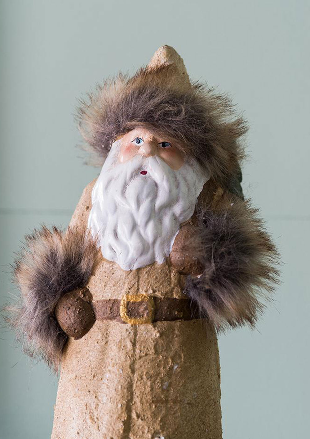 Rustic Santa Claus figurine with faux fur trim for holiday decor
