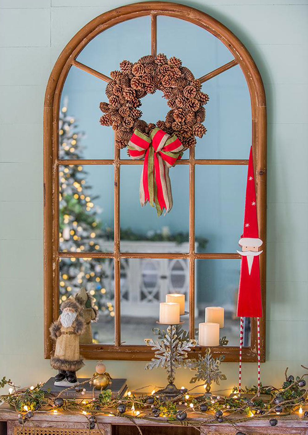 Rustic pinecone Christmas wreath with red and green bow