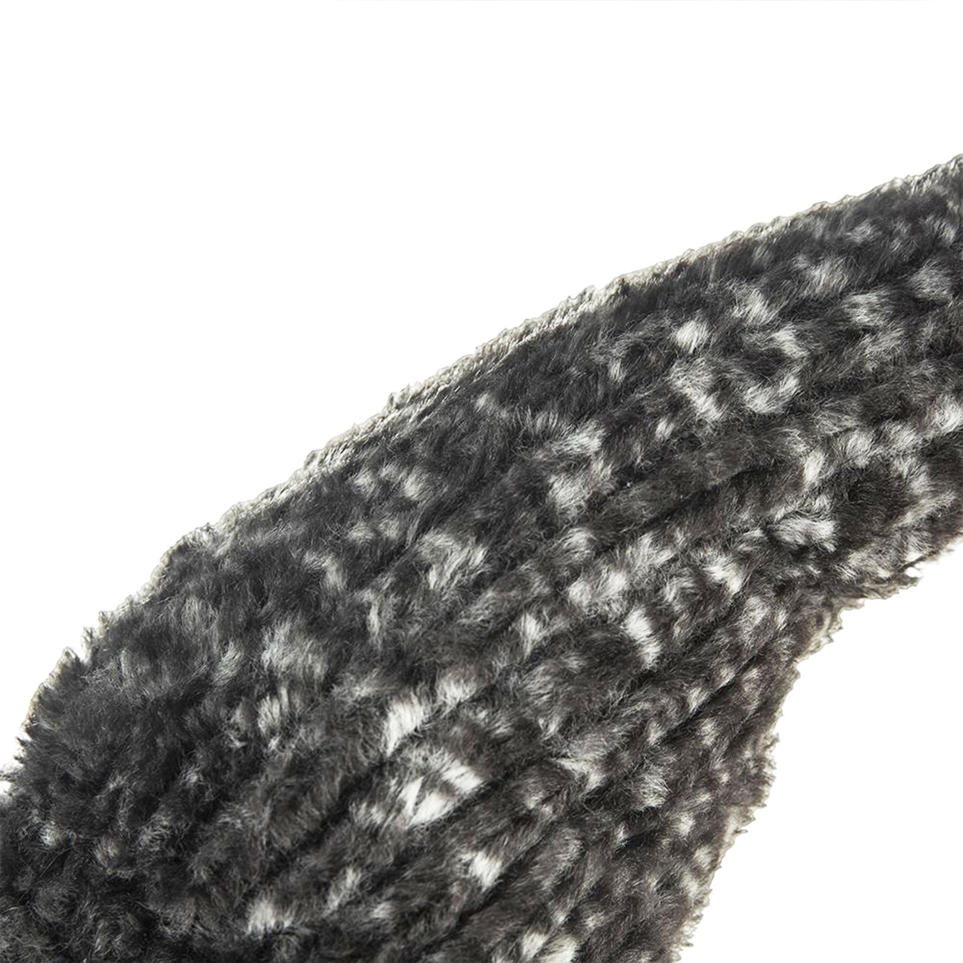 Close up of fuzzy grey and white speckled fabric for a throw blanket