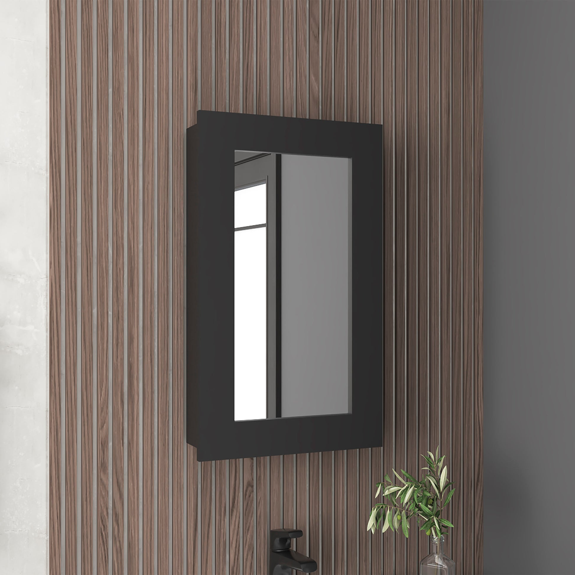 Modern black medicine cabinet with mirrored door mounted on textured wood wall