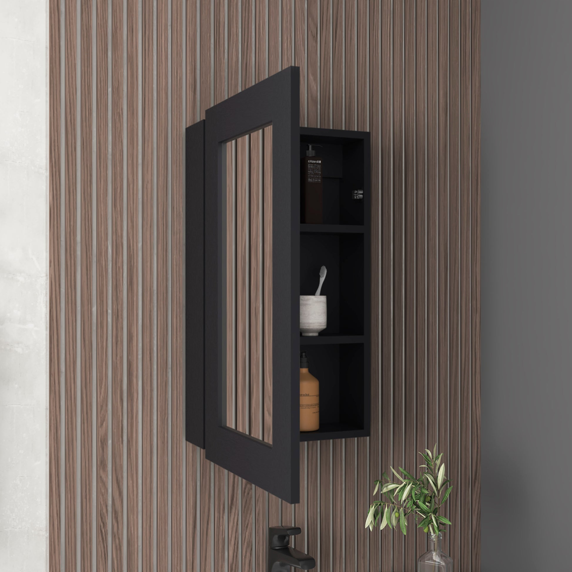 Minimalist black medicine cabinet with mirrored door and open shelving for toiletries