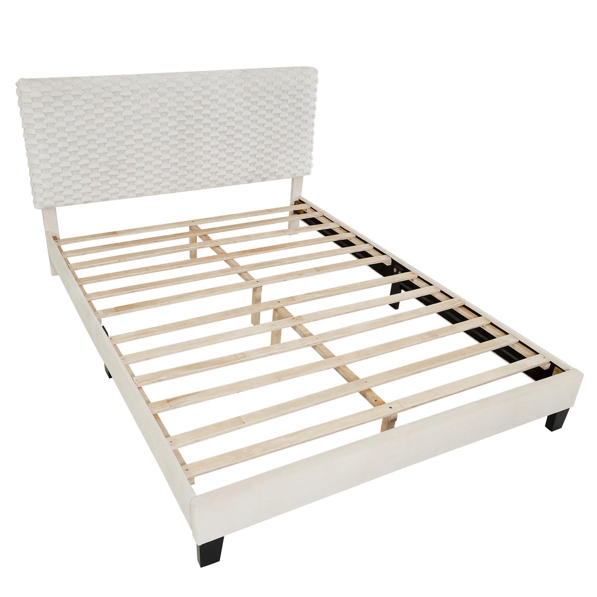 Textured ivory headboard on a modern upholstered bed frame with wooden slats