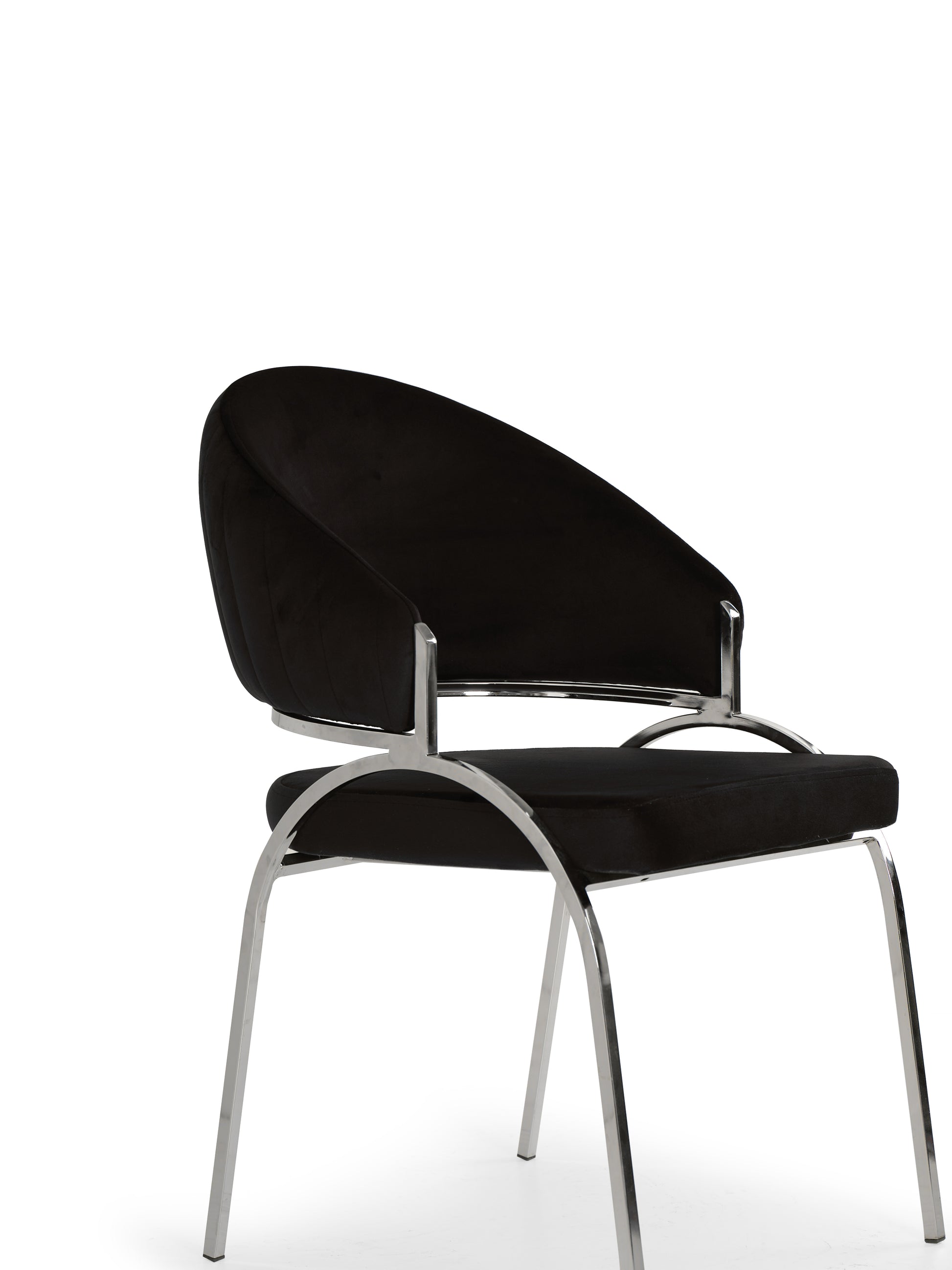Black velvet dining chair with curved back and chrome legs