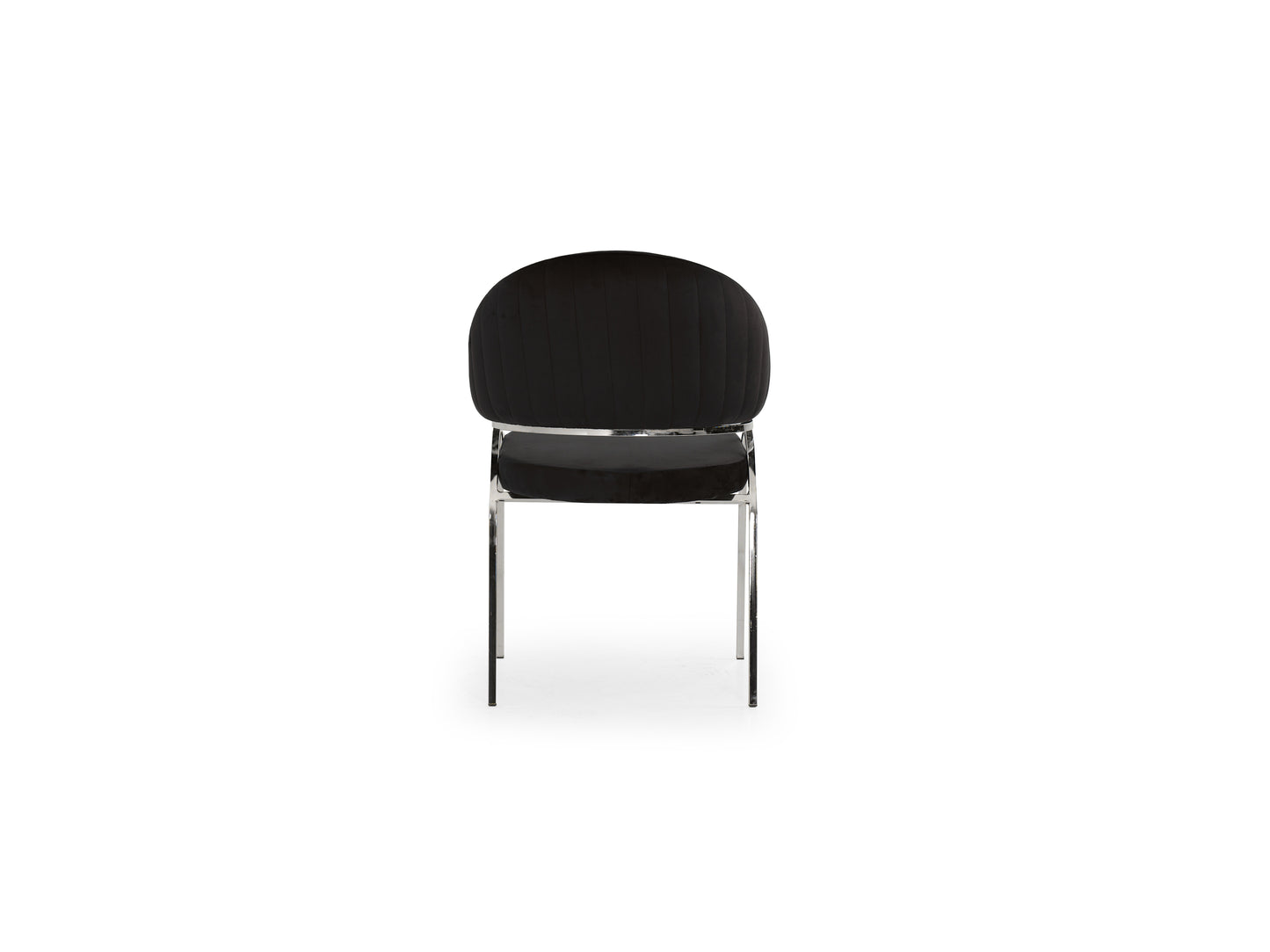 Black velvet dining chair with vertical tufting and chrome legs