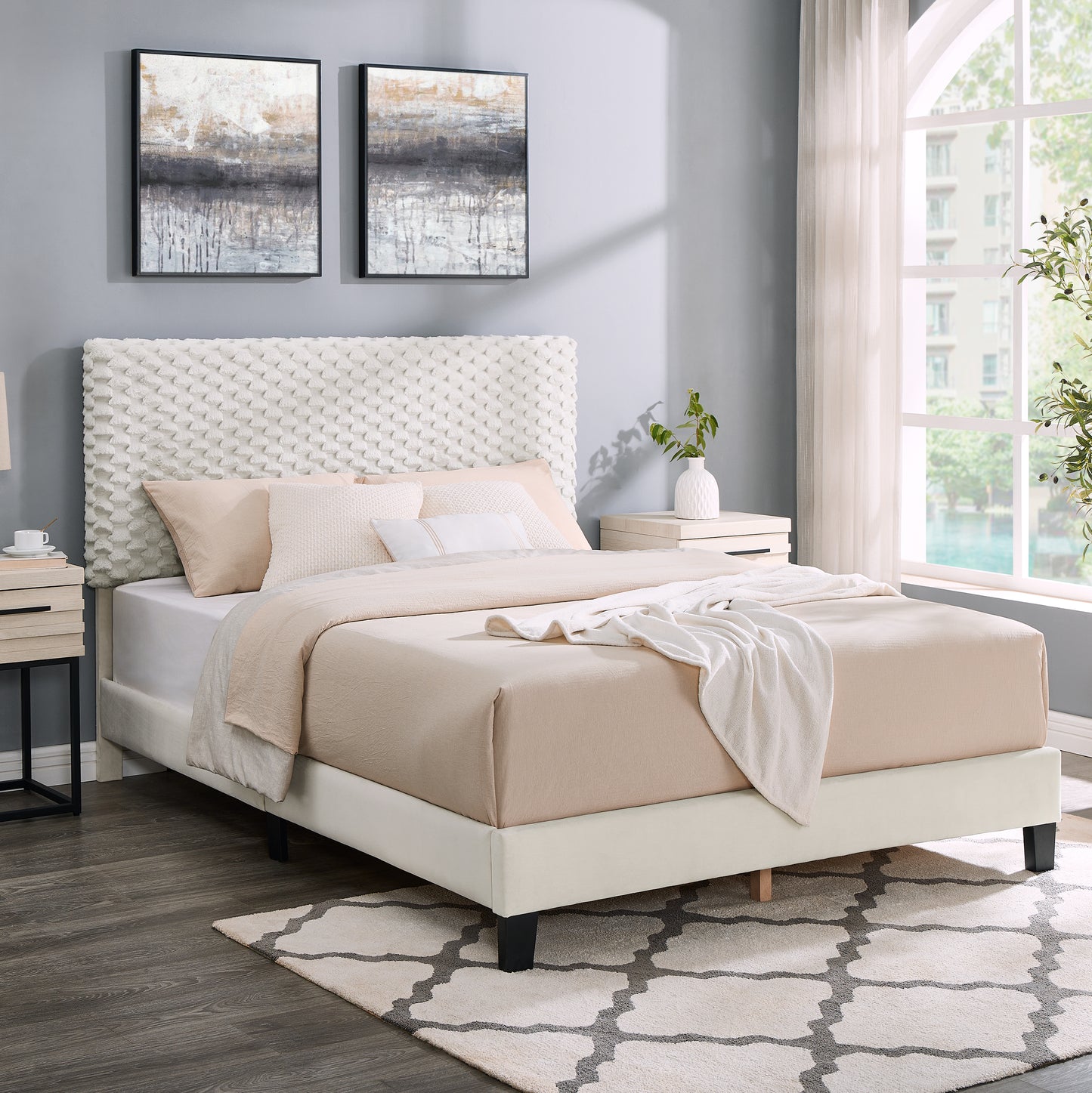 White textured headboard upholstered queen bed frame with neutral bedding