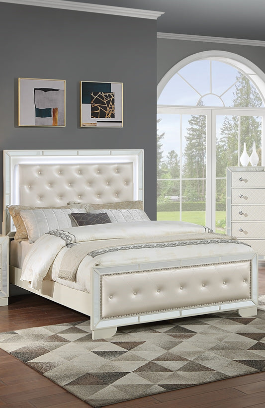 Luxurious cream upholstered bed frame with mirrored accents and diamond tufting