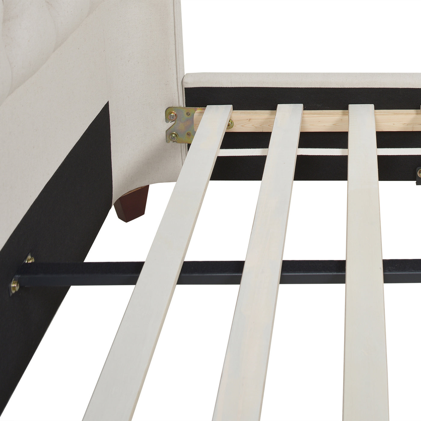 Close up of upholstered bed frame base with wooden slats
