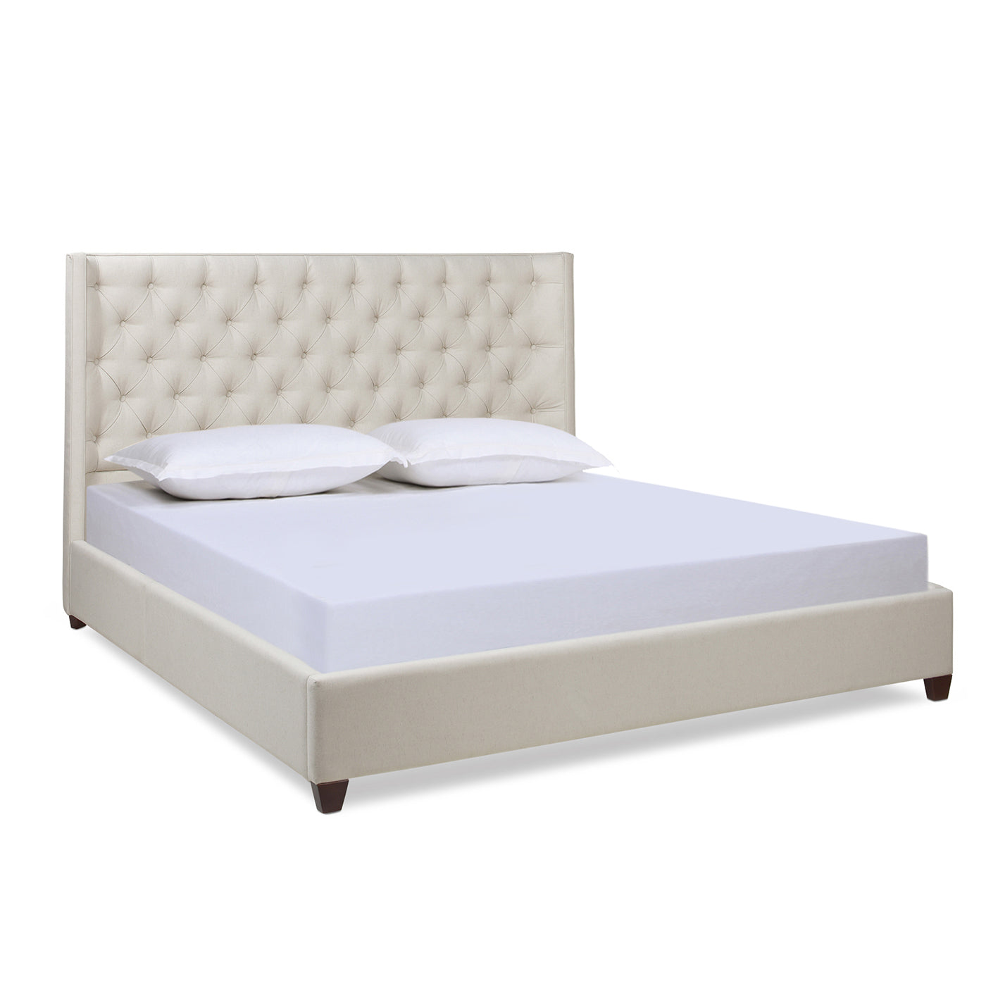 Tufted beige upholstered bed frame with diamond button detail and wooden legs