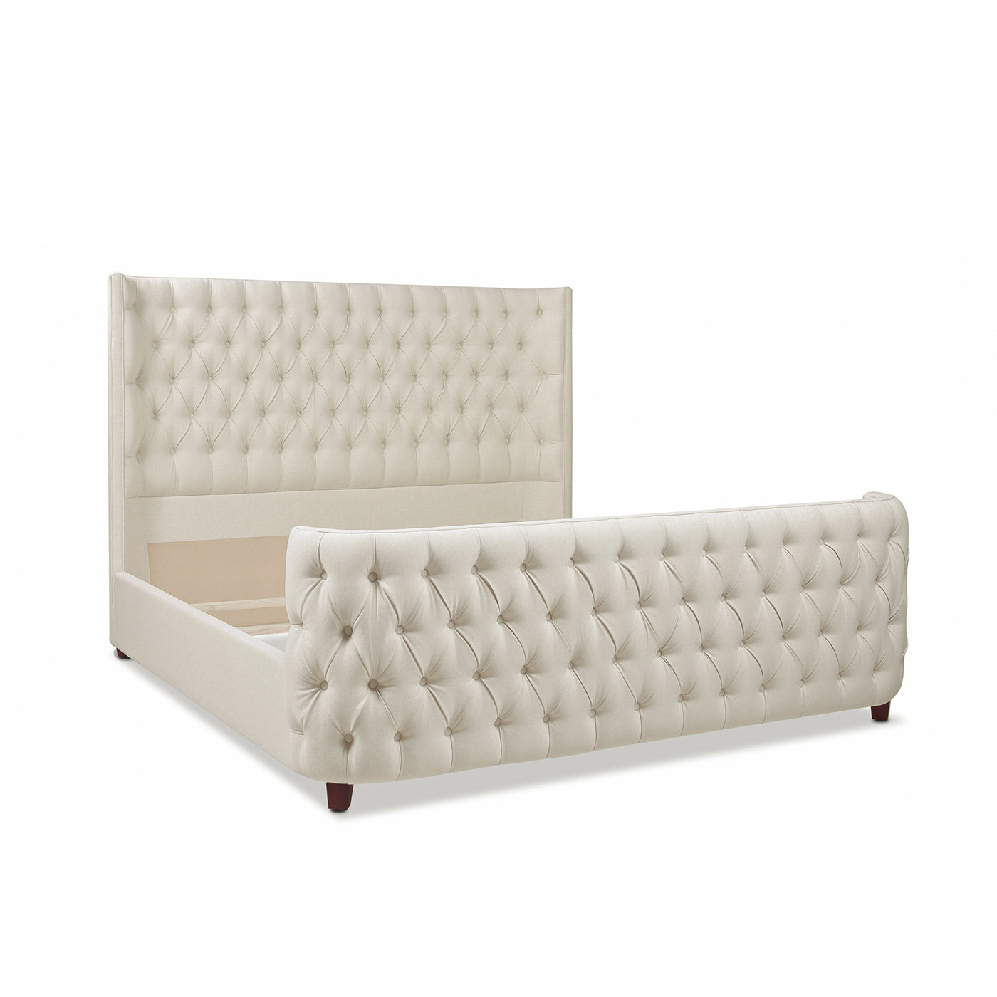 Tufted cream upholstered sleigh bed frame with dark wood legs