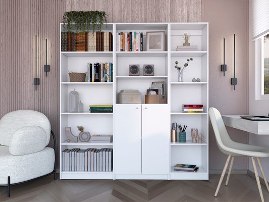 White modular bookshelf filled with books decor and storage baskets