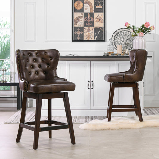 Brown tufted leather swivel bar stool with nailhead trim and dark wood legs