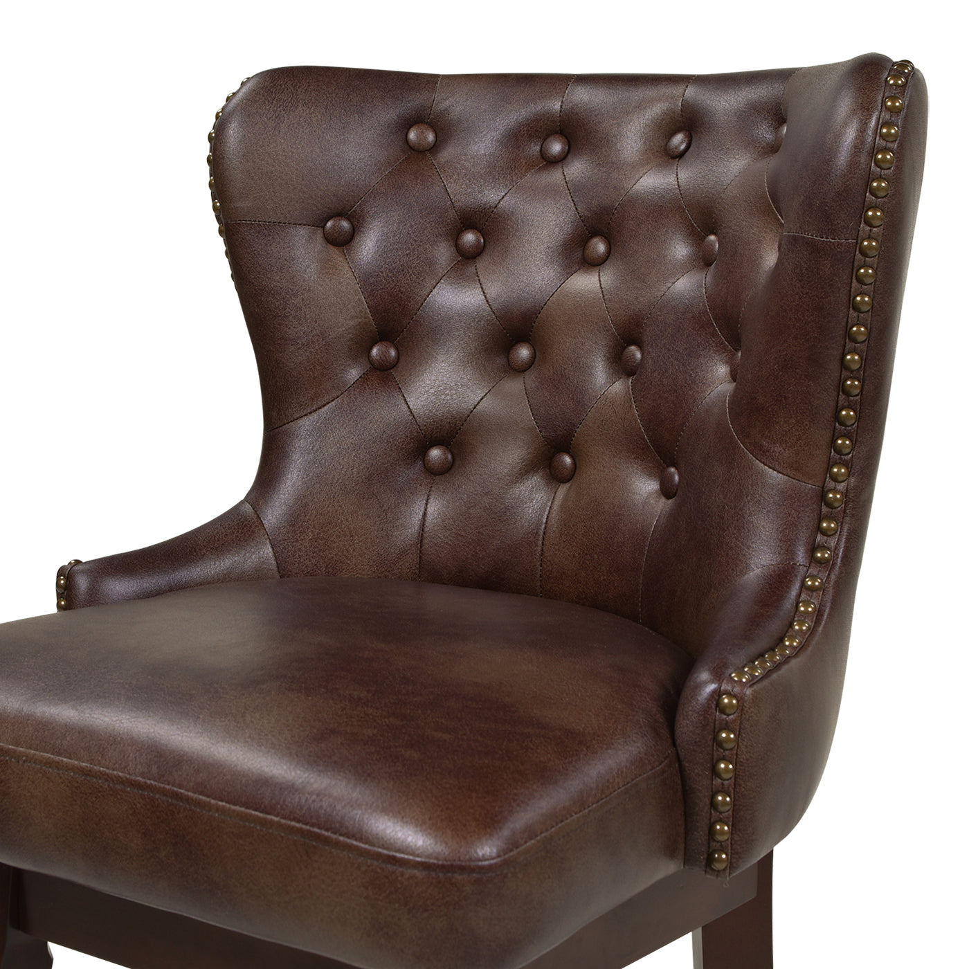 Brown leather wingback chair with diamond tufting and brass nailhead trim