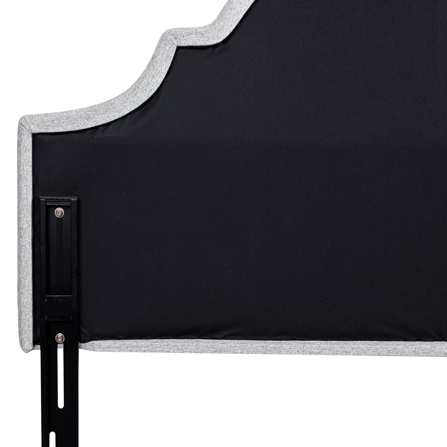Grey upholstered headboard with black metal bed frame attachment