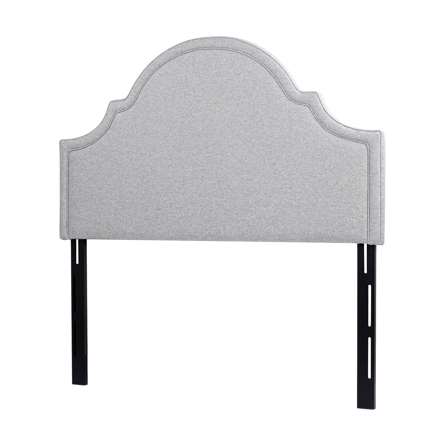Light grey upholstered headboard with curved top and double stitching detail