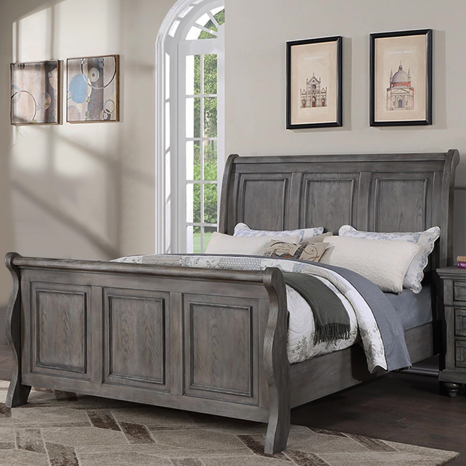 Gray wooden sleigh bed frame with paneled headboard and footboard