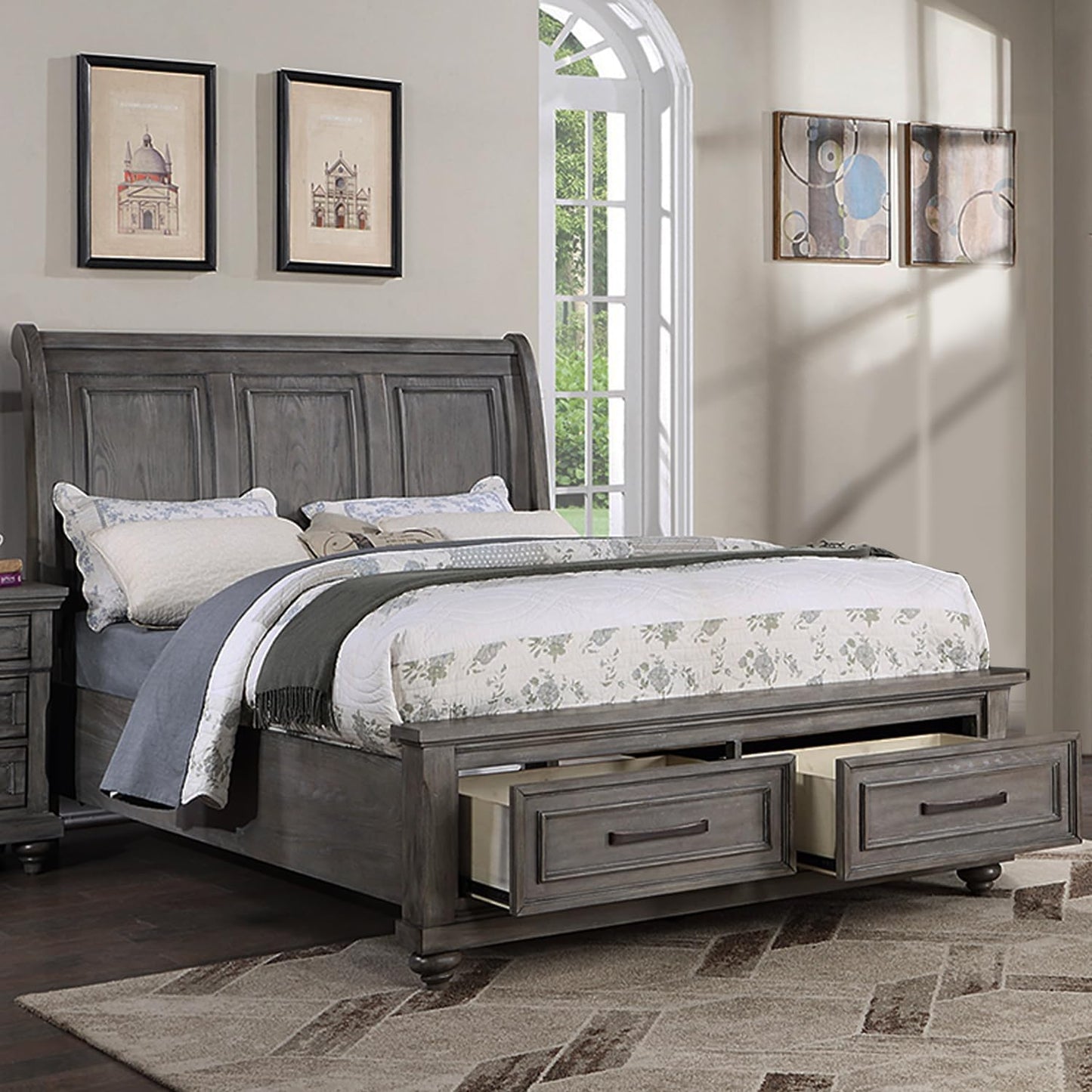 Gray wooden sleigh bed with storage drawers featuring a tufted headboard and ornate details for a master bedroom