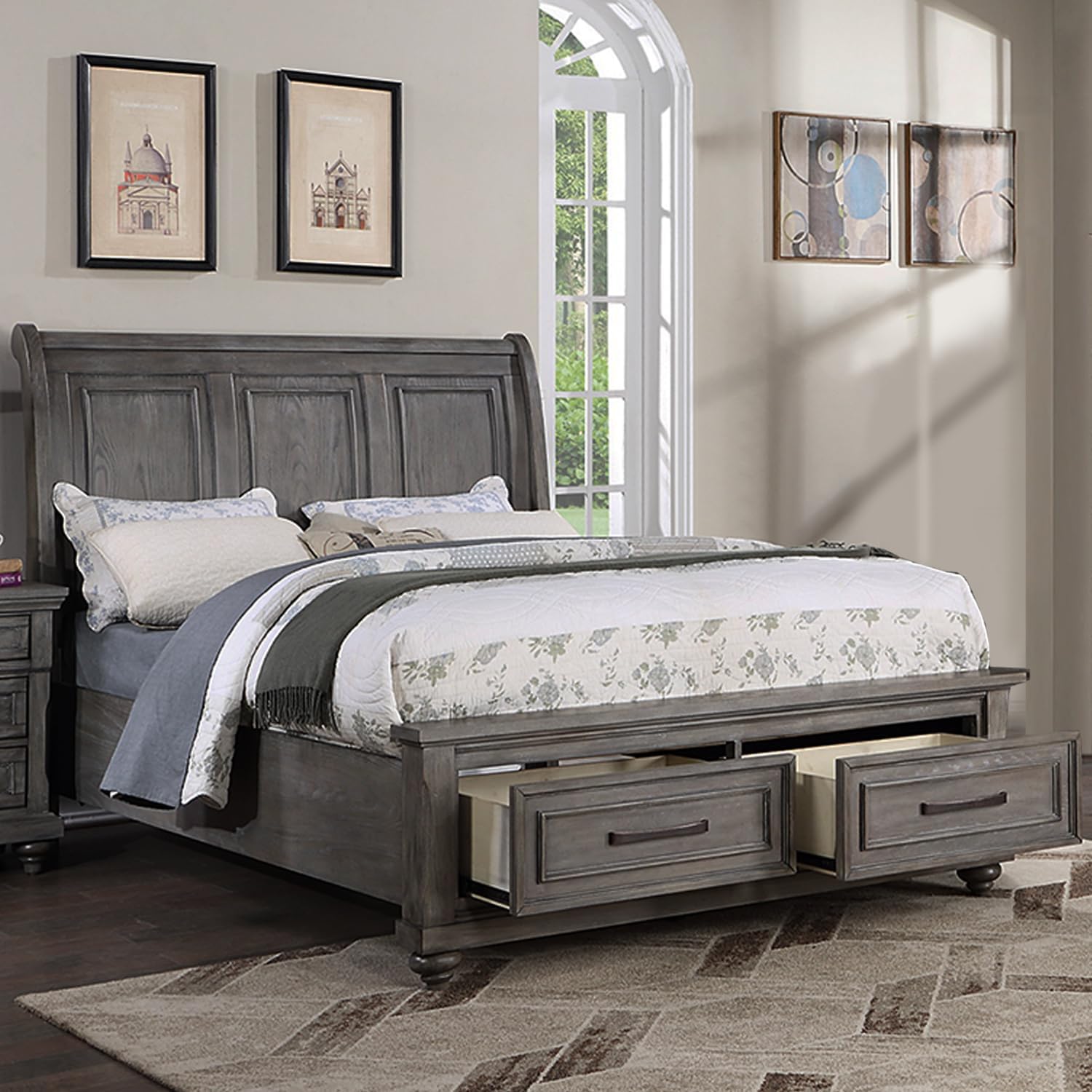 Gray wooden sleigh bed with storage drawers featuring a tufted headboard and ornate details for a master bedroom