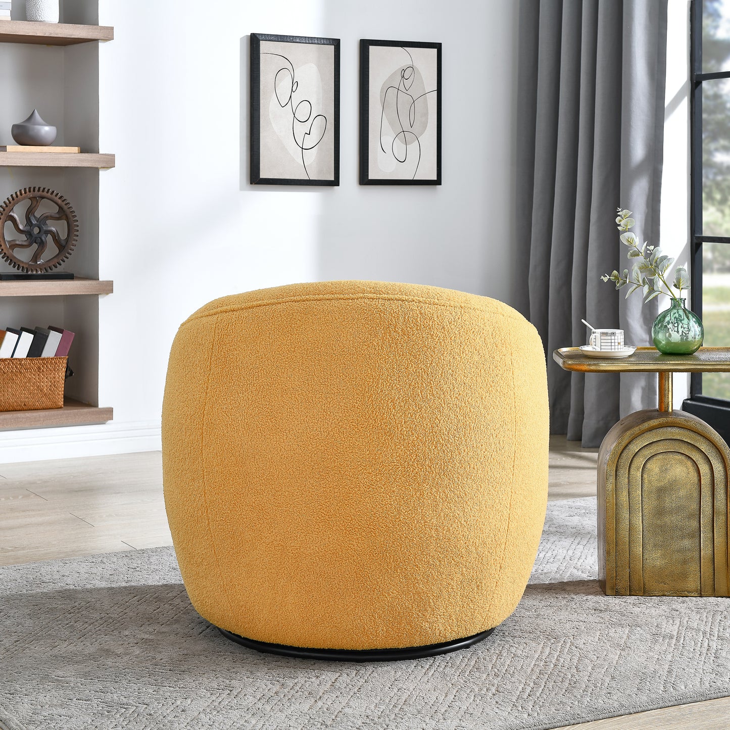 Yellow textured fabric round ottoman with black base