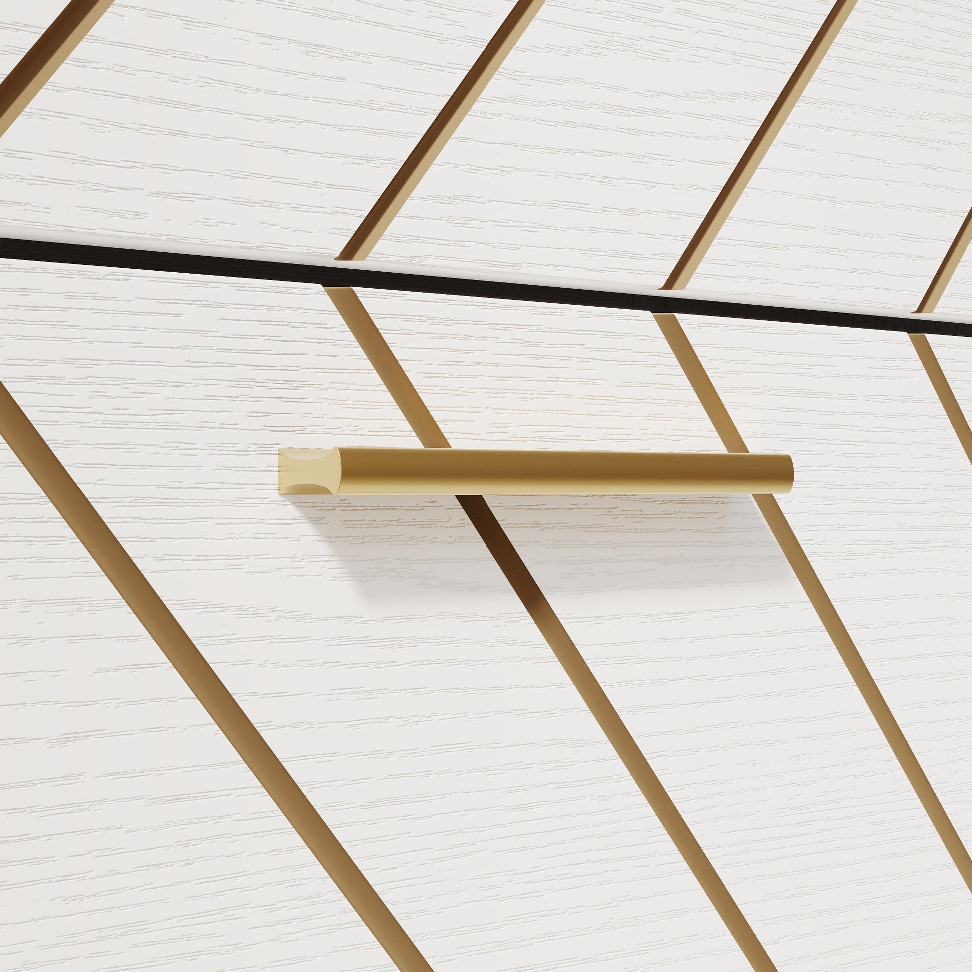Modern brass bar pull on white wood grain drawer front