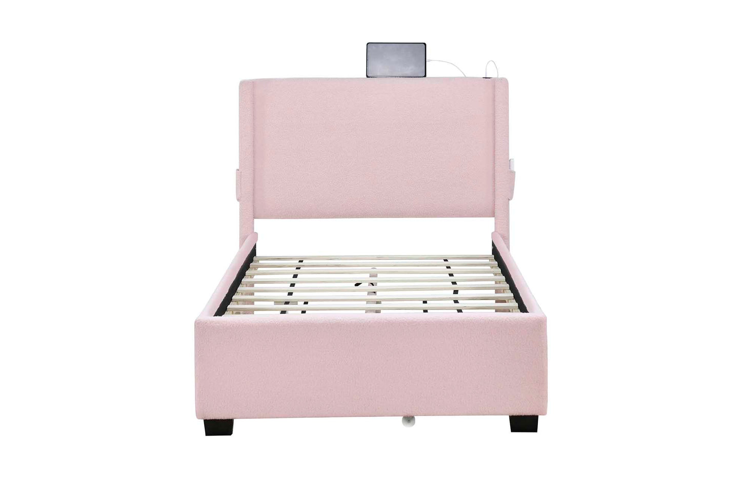 Pink upholstered twin bed frame with integrated USB charging station and headboard