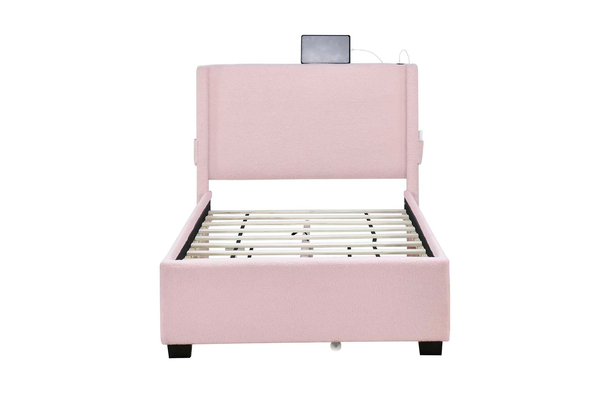 Pink upholstered twin bed frame with integrated USB charging station and headboard