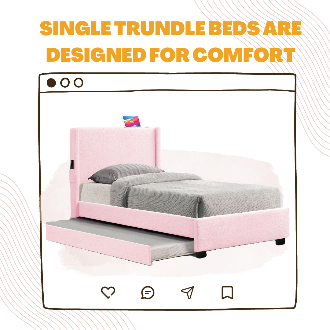 Pink upholstered single trundle bed with grey bedding and headboard