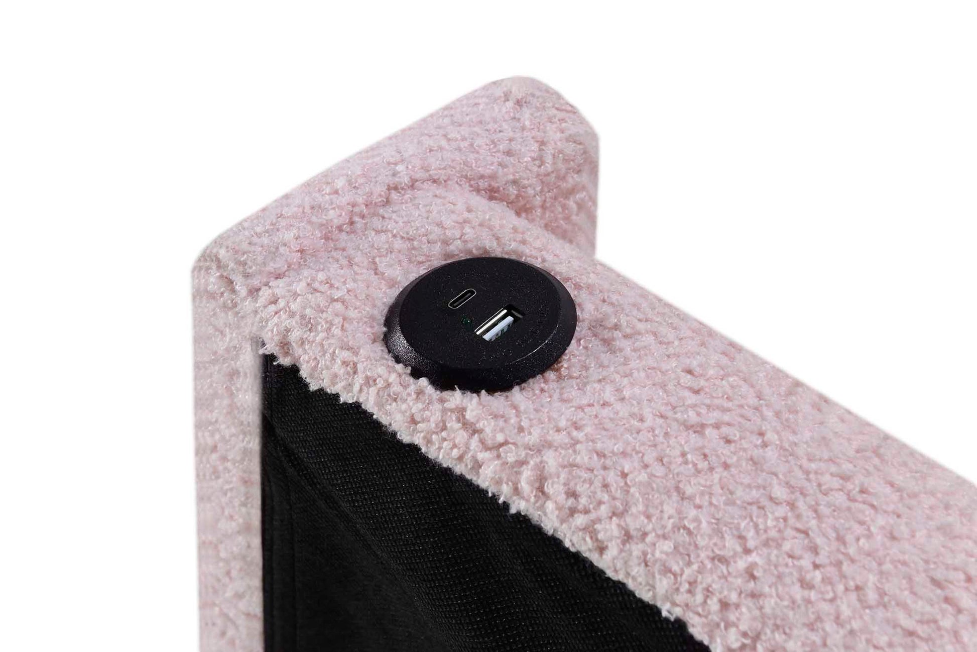 Pink boucle fabric armchair with integrated USB charging port