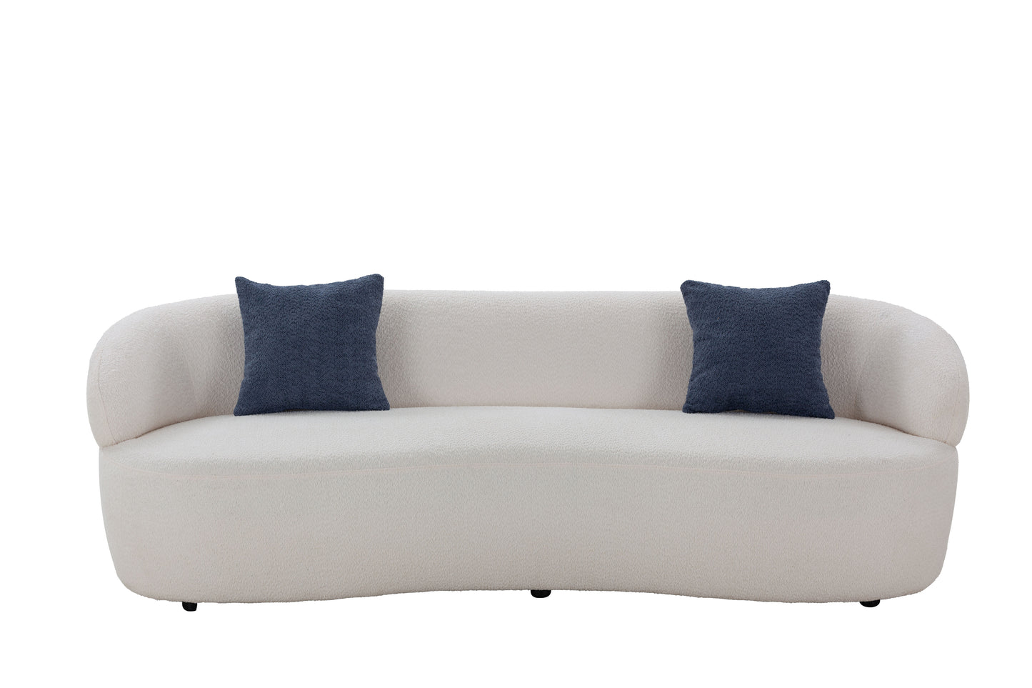 Cream boucle sofa with curved arms and two dark blue textured throw pillows