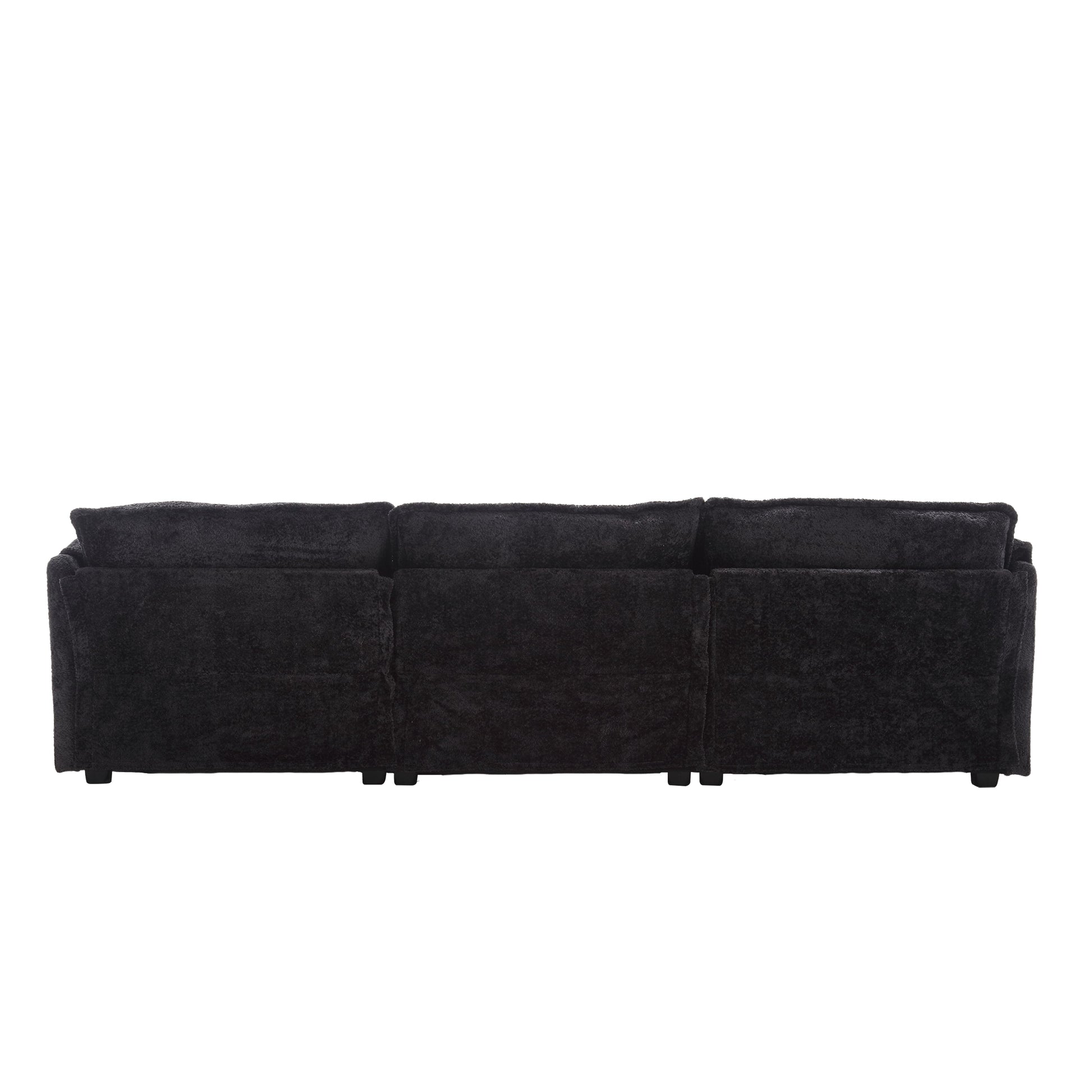 Black threeseater plush sofa back view modern living room furniture