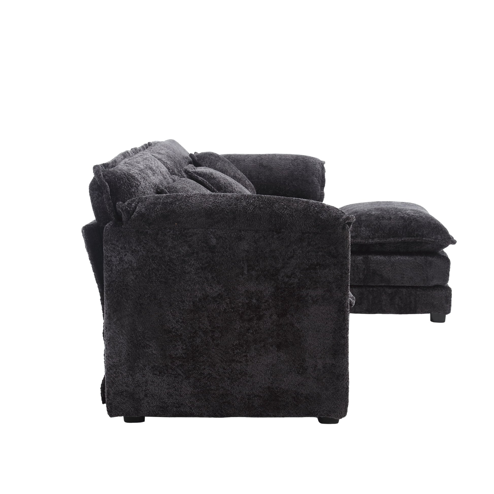 Plush dark gray sectional sofa with multiple soft cushions perfect for a cozy living room