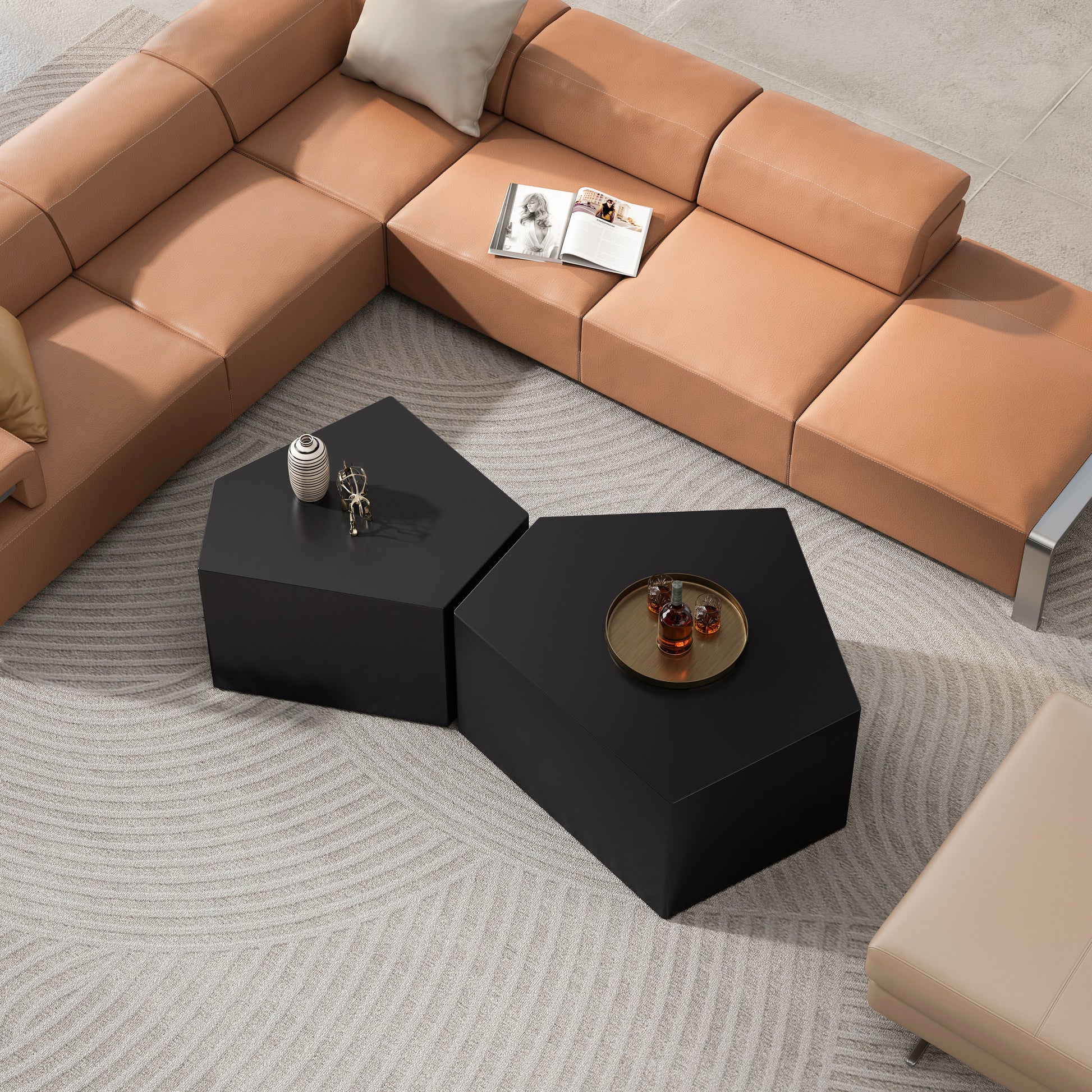 Tan leather sectional sofa with white stitching details and cream pillows