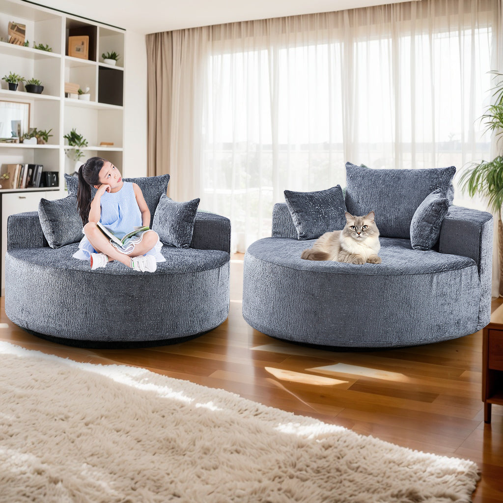 Plush grey swivel armchair with matching cushions perfect for a modern living room