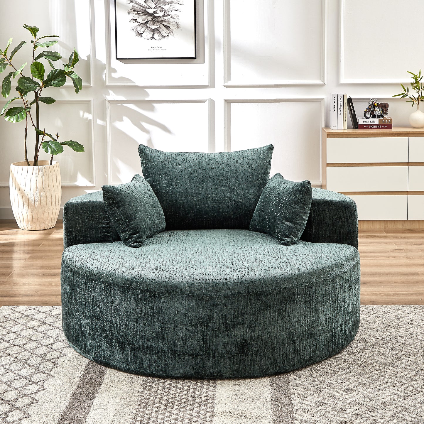 Teal velvet round armchair with plush cushions for a cozy living room