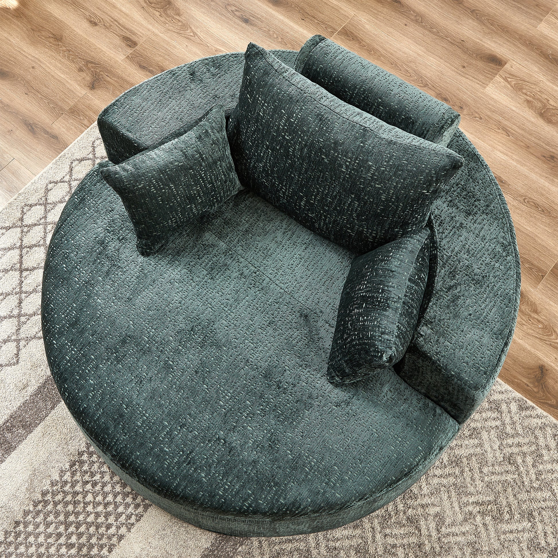 Plush teal velvet sectional sofa with textured fabric and scattered cushions