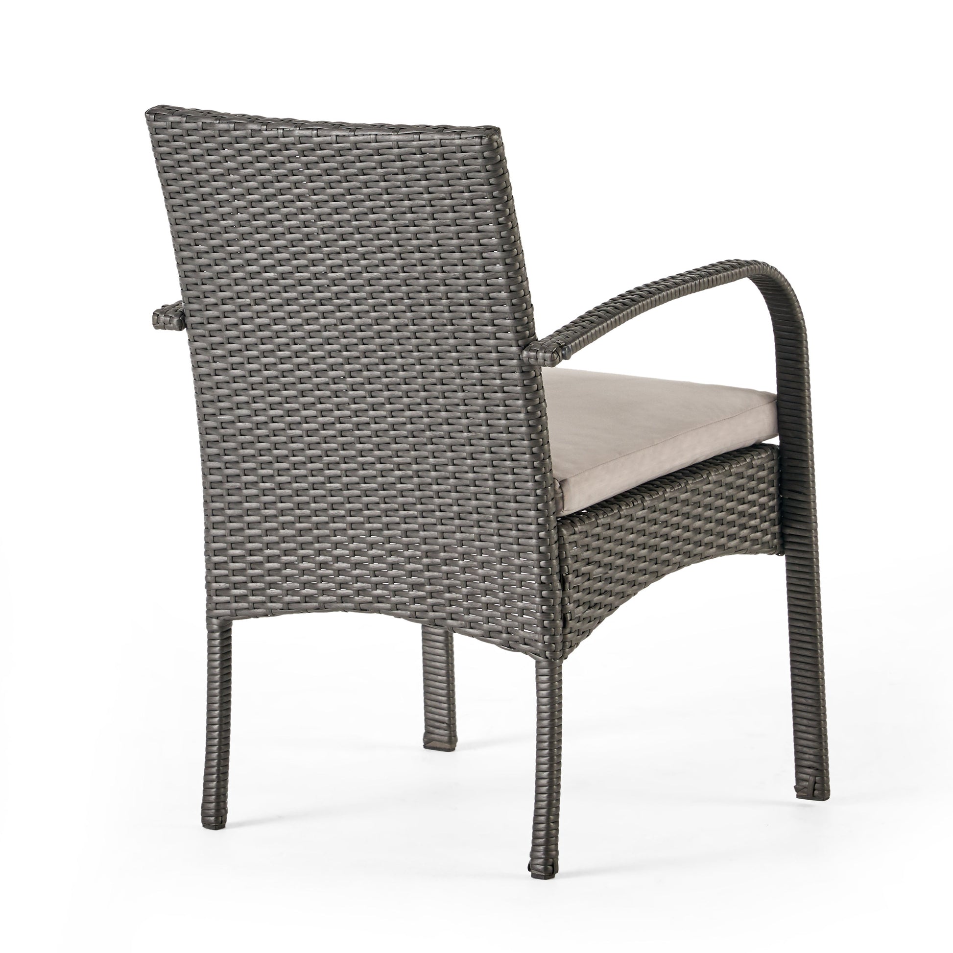Dark gray wicker outdoor chair with plush beige cushion side view