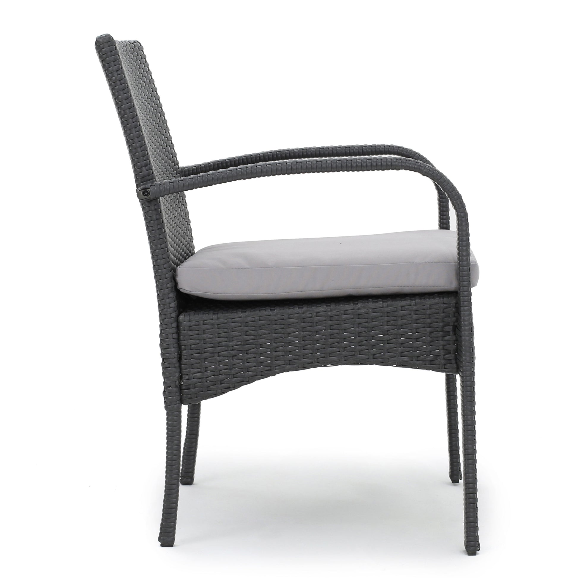 Dark grey wicker patio chair with a light grey cushion featuring curved armrests for outdoor comfort