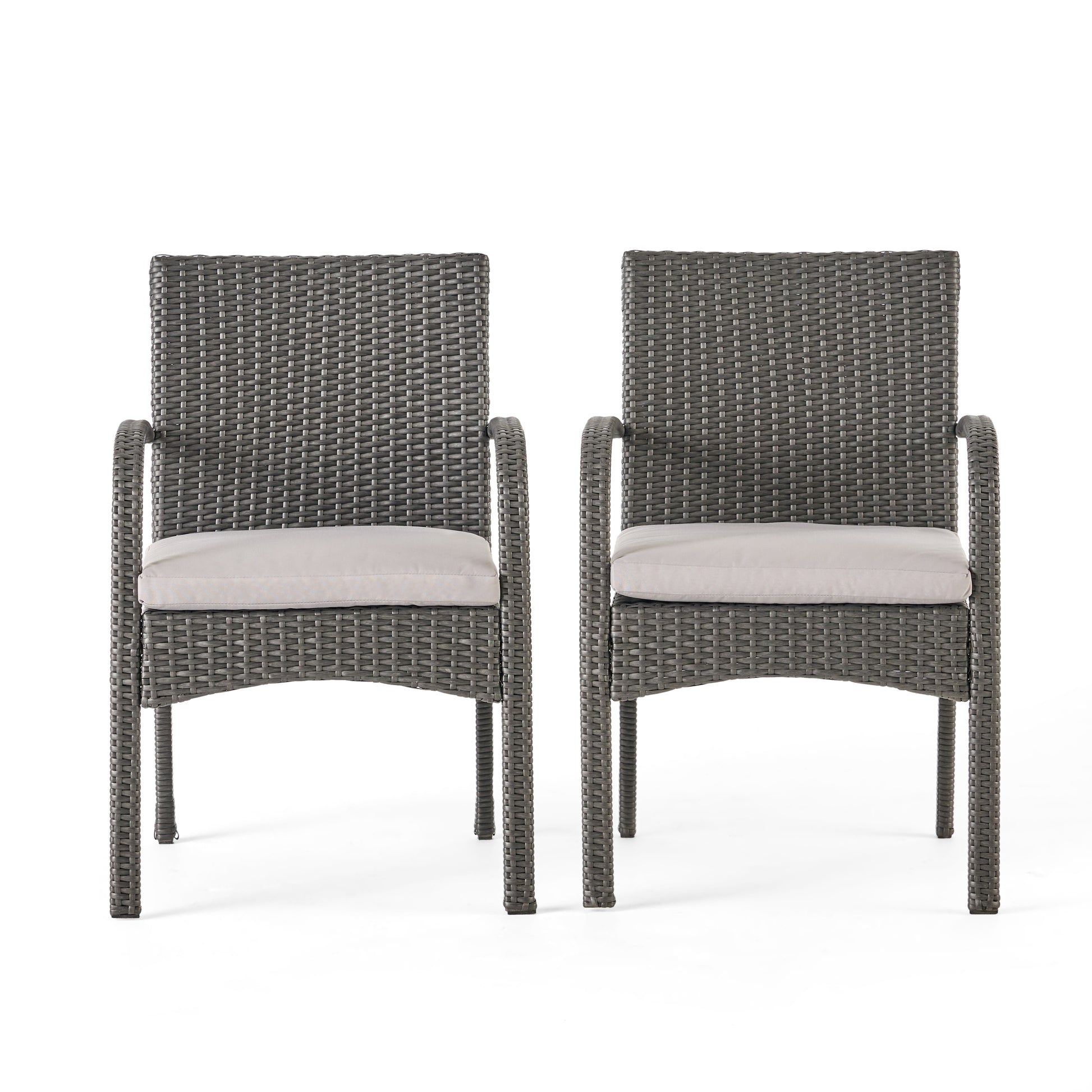 Pair of grey woven resin outdoor chairs with light grey cushions