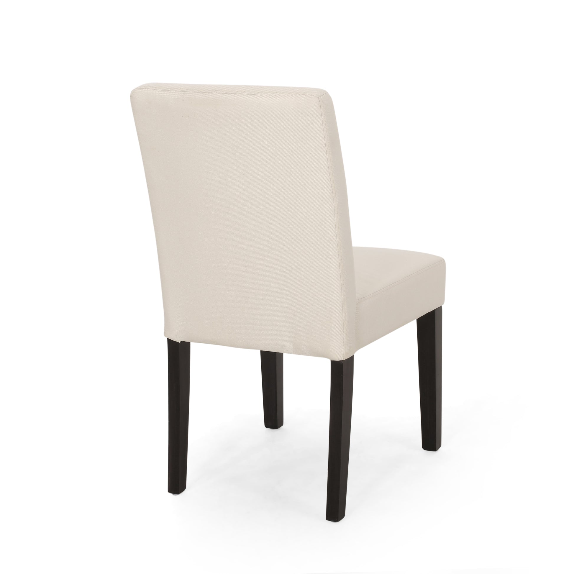 Cream upholstered dining chair with dark wood legs viewed from the back