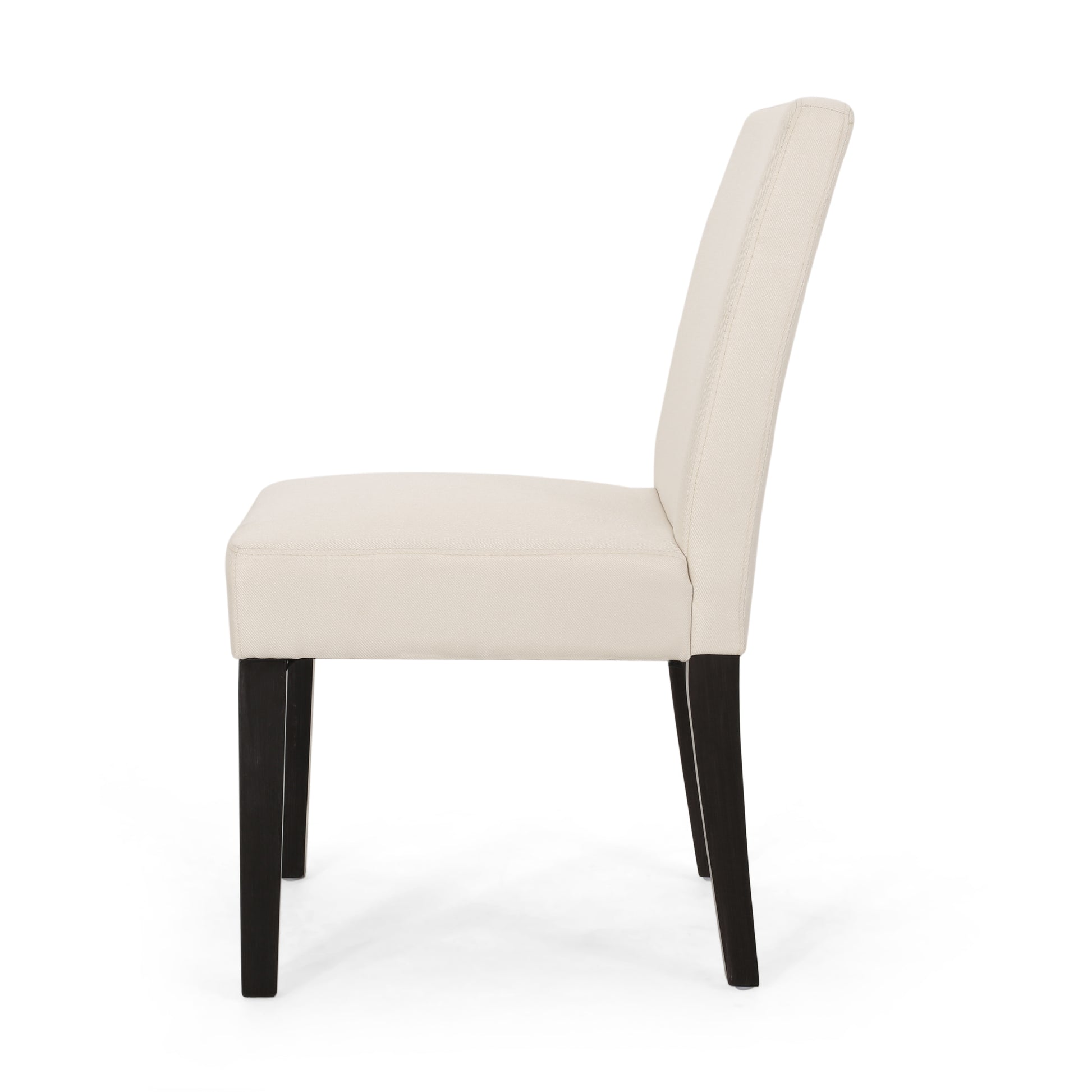 Modern dining chair with cream fabric upholstery and dark wood legs side view